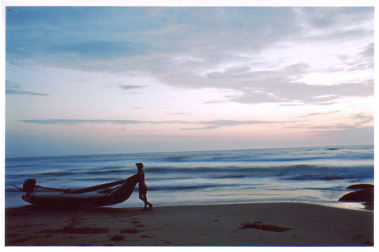 Kovalam beach, Man with Boat amazing sky