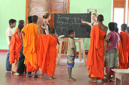 Woman teaching english in India, Volunteer